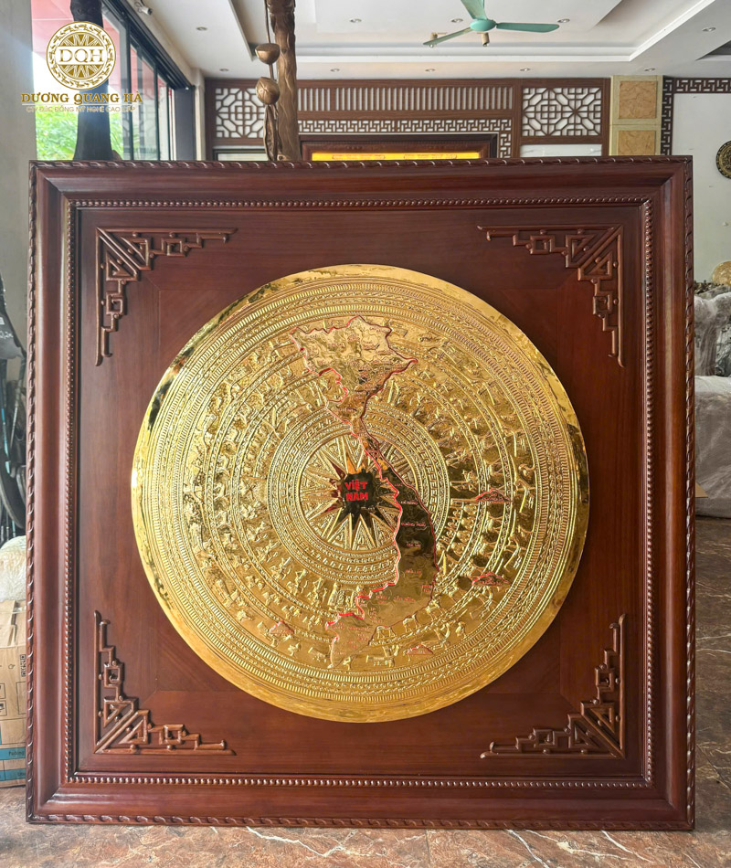 giá tranh mặt trống đồng